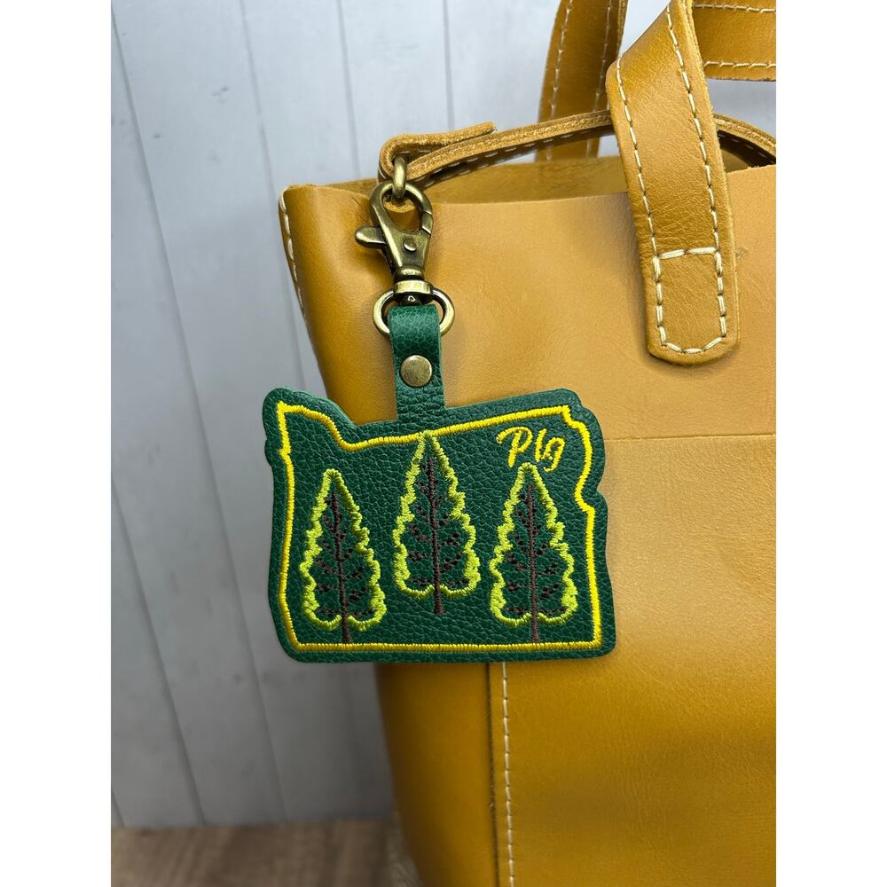 Portland Leather Bag Charm Oregon Purse Charm PNW Oregon Pebbled Gold Stitched